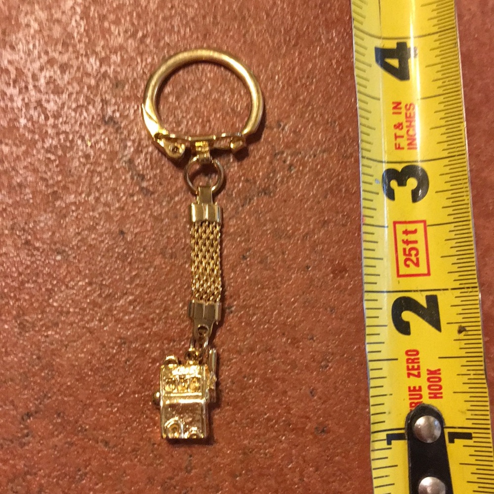 Gold tone slot machine key chain